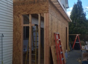 Wooden frame of house addition under construction