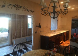 Interior of kitchen with walls torn out to add an addition