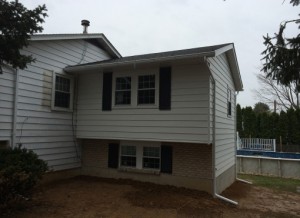 House with new room installed as an addition