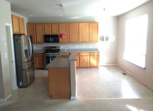 Interior of kitchen with outdated kitchen cabinets
