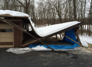 Old carport after falling down from weight of snow