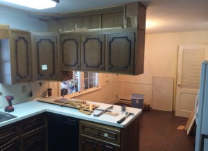 Home with outdated cabinets and counter