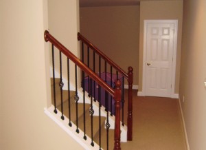 new basement stairs with wooden railings