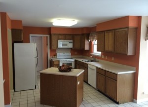 Small kitchen with crowded space and outdated features