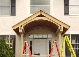 Wooden frame of awning over front door
