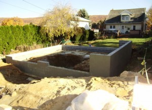 concrete foundation for garage being constructed